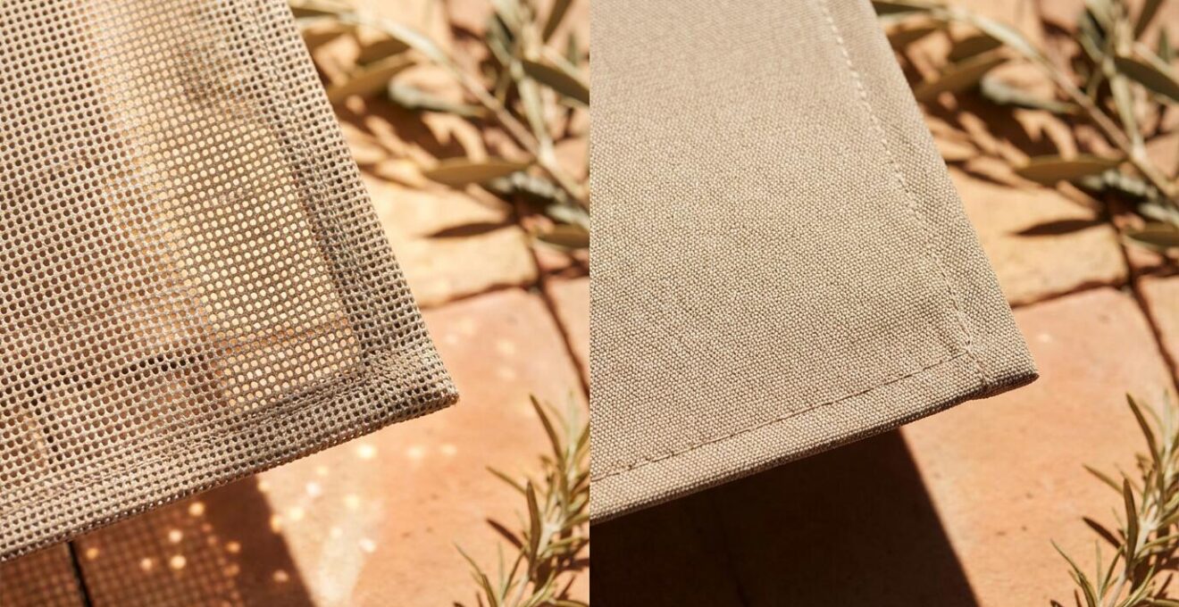 Vista comparativa de lona microperforada screen versus lona acrílica opaca bajo el sol mediterráneo